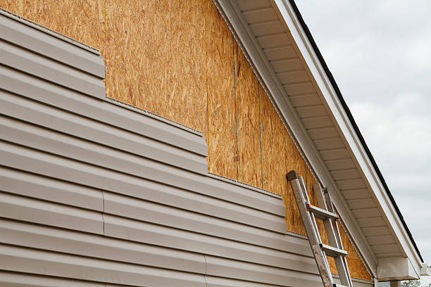 Professional Vinyl Siding technician working in Boonville, IN